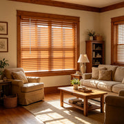 Brown PVC mini blinds installed on a living room window with closed horizontal slats